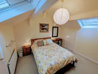 Cosy yet spacious property with private parking, close to the village centre.