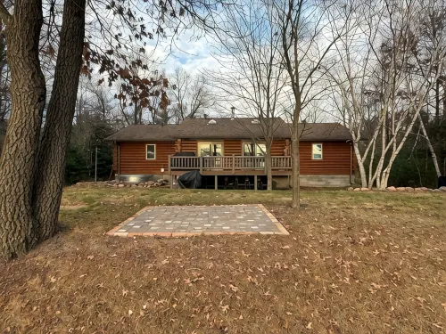Escape to a Beautiful 4-Bedroom 2-Bath Waterfront Log Home in Danbury, Wisconsin