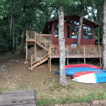 Quaint two bedroom cabin just a few steps away from and on Mountain Rest Lake.