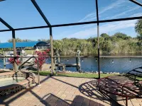 SO. GULF COVE - WATERFRONT HOME ON CANAL-SALT WATER POOL & SPA-NEAR GULF BEACHES - Strand
