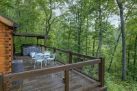 The Mighty Acorn, Bungalow is a delightful cozy tiny home in the woods.