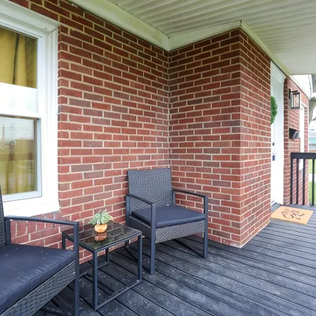 Touchdown Bungalow: Charming HOF Village Home