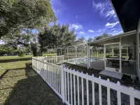 Four Beds, three baths, heated pool, and a Golf Course. What more do you need!! - 3-Star