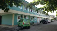 Rumah Dempo Syariah by Zuzu Hotels near Masjid A. Yani Mega Mall