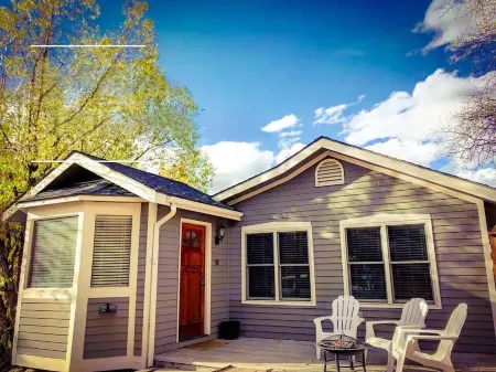 Private Hot Tub and Steps to Main Street - Charming Cottage Retreat