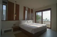 Araya Beach Casas Hotels in Lian