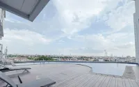 2BR near Marvell City Mall at Linden Apartment By Travelio