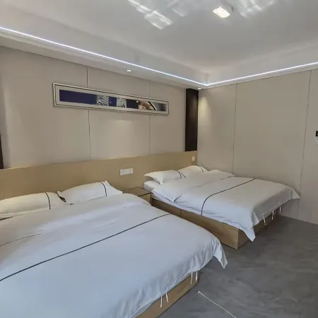 Ruxin Business Hotel (Chengwu Shengshi International Building Materials City)