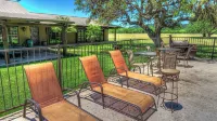6-bedroom Lodge on 12 acres in Concan, Texas.  Swimming pool & hot tub.
