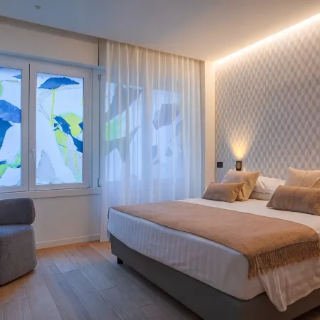 San Ambrogio Apartments Отели рядом с достопримечательностью «Сант'Еусторджио»