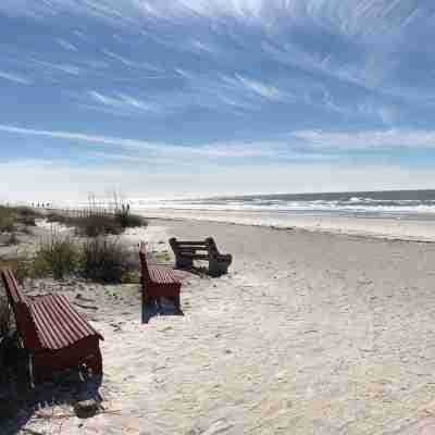 Enjoy beautiful sunsets from the balcony or wade into the waves just steps away! Fitness & Recreational Facilities