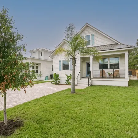 Brand new 4 bedroom with 2  master suites and pool, steps to the beach.