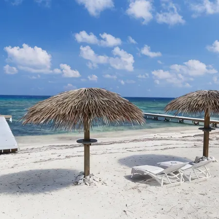 Coco Kai Beach Front Villa with Heated Pool and Private Dock