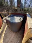 Elevated eclectic yurt with wrap-around porch, hot tub, and mountain view!