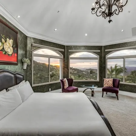 Castle on a hill, breathtaking views, surrounded with pools, trees, and lawn