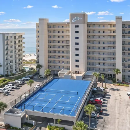 Luxurious 2nd floor beachfront condo w wrap-around balcony @ The Enclave