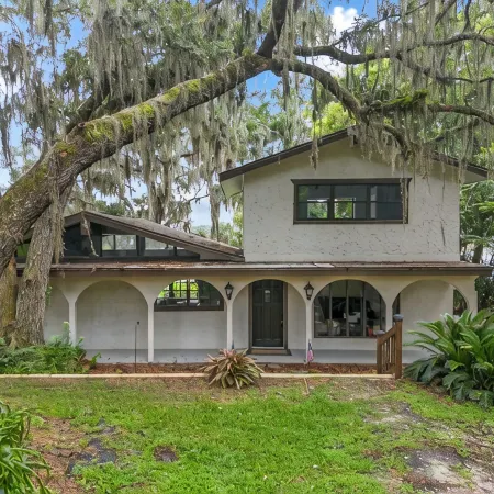 Unique Spanish Style Lakefront Home! Kayaks and Paddle Boat!