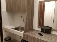 Apatel Ecohome Citra Raya by Santi Room Hotels in Panongan