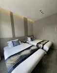 Liupanshui Qiuboju Homestay (Wanda Plaza) - parkir