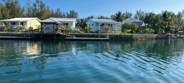 Charming New Blue Studio on water with dock, WiFi & AC in fun time Freeport Hotels in Freeport