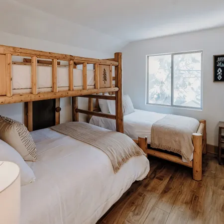 This Cabin is rustic, located minutes to slopes & village