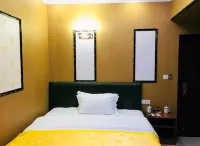 Yilong Happy Home Hotel - Inns