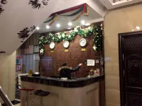 Daguan Xinhao Business Hotel - Parkplatz