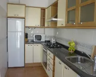 2 bedroom top floor apartment, swimming pool, Air-Con.
