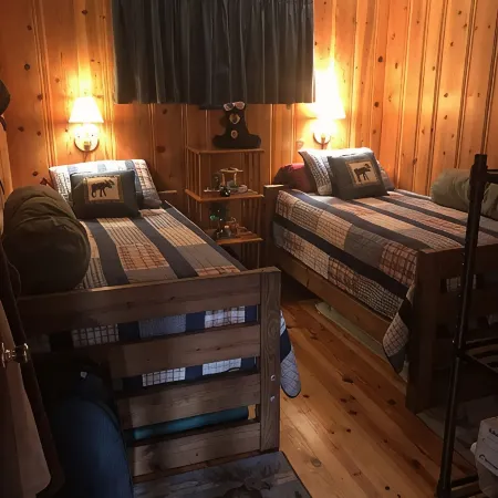 Quaint two bedroom cabin just a few steps away from and on Mountain Rest Lake.