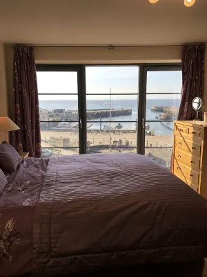 海濱，精緻公寓帶有海景和港景 - 海滩