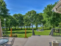 Lakefront Home with Boat Slip, Fire Pit and Golf Cart, Tesla Charger - 4-Star