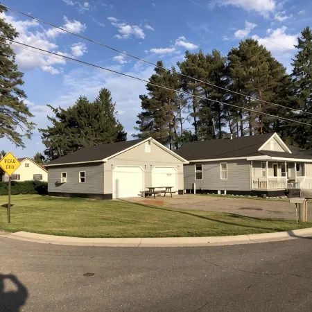 Central located. Includes finished 2 car garage! 1 minute from beach!
