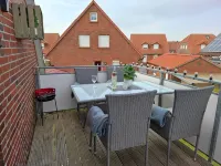 Apartment Lüttje Amselnüst - central location directly on the dike with balcony - バルコニー
