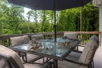 Modern Forest Escape w/ Pickleball, Hot Tub, Sauna, Gym, Fire Pit & Gameroom! - 3-Star
