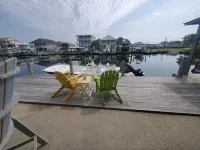 Deep-Water Canal Front Coastal Cottage Only Steps to the Beach & Pet Friendly! - ビーチサイド