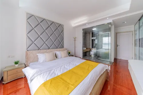Xingfu Family Apartment (Huanshi East Road) - Condos