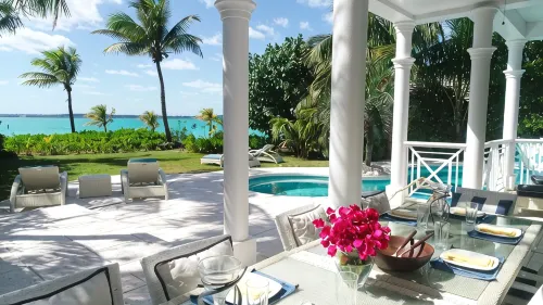 Stunning waterfront property with panoramic sunset views + pool + dock - 4-Star