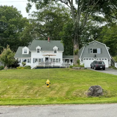 Enjoy spectacular views of Lobster Cove. Large yard, EV charger & dog friendly.