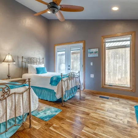 Quiet, spacious home with large deck in secluded Forest Oaks in central Edmond .