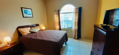 Spring Palm Estate Hotels near Charles Town church of God