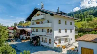 Ferienwohnungen Restaurant Pizzeria Langreiter