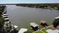 Lakeside Landing is on the Water with Beautiful Views and a Large Deck.