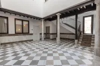 Apartamentos Puerta Elvira Suites 3000