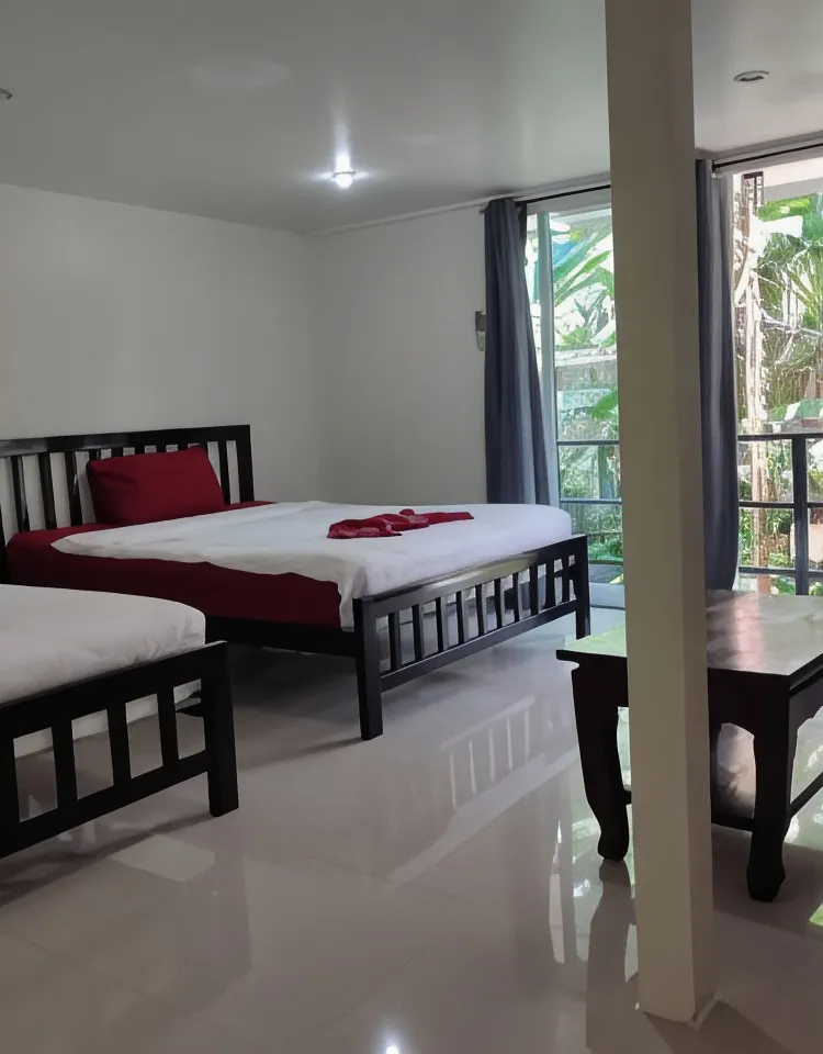 ห้องมาตรฐานเตียงใหญ่หรือเตียงแฝดพร้อมระเบียง