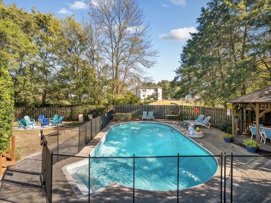 Poolside Retreat - Spacious 4-Bedroom Retreat with Pool, Hot Tub, Game Room&More