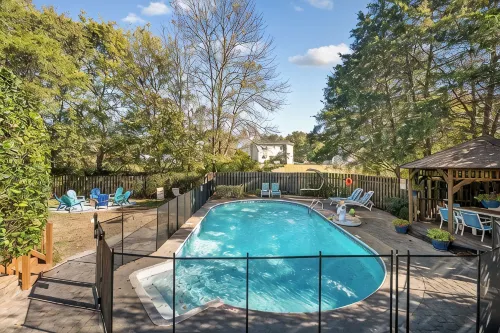 Poolside Retreat - Spacious 4-Bedroom Retreat with Pool, Hot Tub, Game Room&More - Private Pools