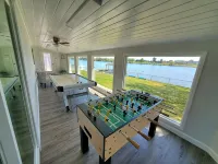 Lakefront Getaway. Private Waterfront Home with Dock and Sunroom. - 3-Star