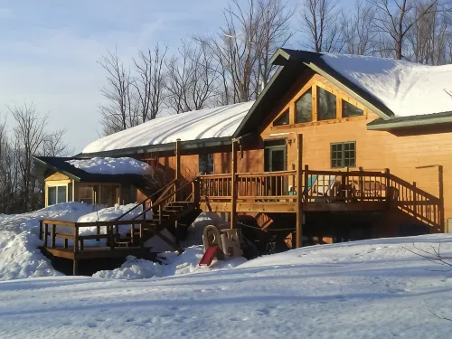Secluded beautiful home (rental of half of our home) 12 miles from Marquette, MI