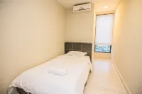 Marina Travellers Suite Sky Karamunsing - gimnasio