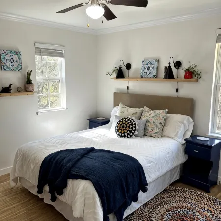 Cozy coastal oasis w/ wooded views and wrap around deck. Close to Dauphin Island